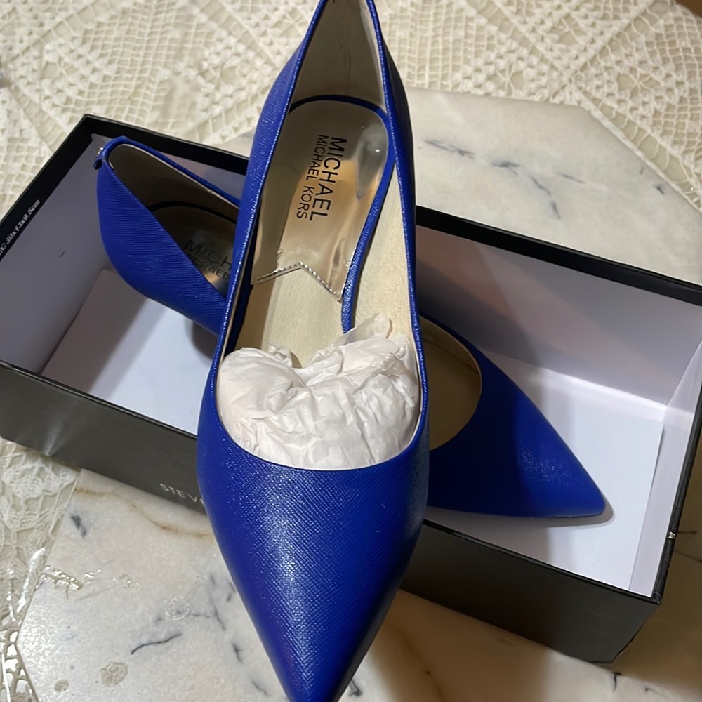 These a pair of Michael Kors royal blue size 7 heels